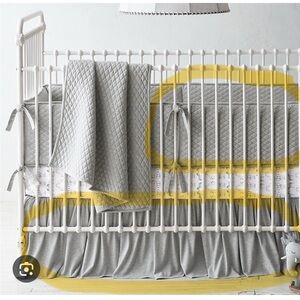 RH Baby grey crib skirt and grey bumper